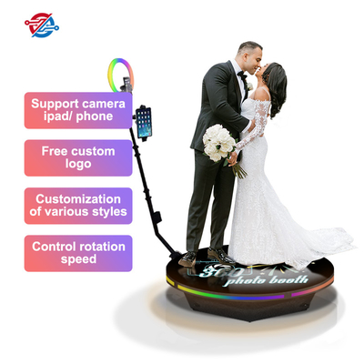 La piattaforma girevole automatica della cabina della foto di Spinner 360 per il matrimonio promuove la relazione